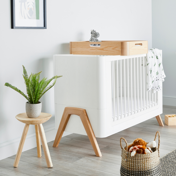 Gaia Baby Hera Cot Bed Scandi-White and Natural. Scandi-inspired minimalist white wooden cot bed. 