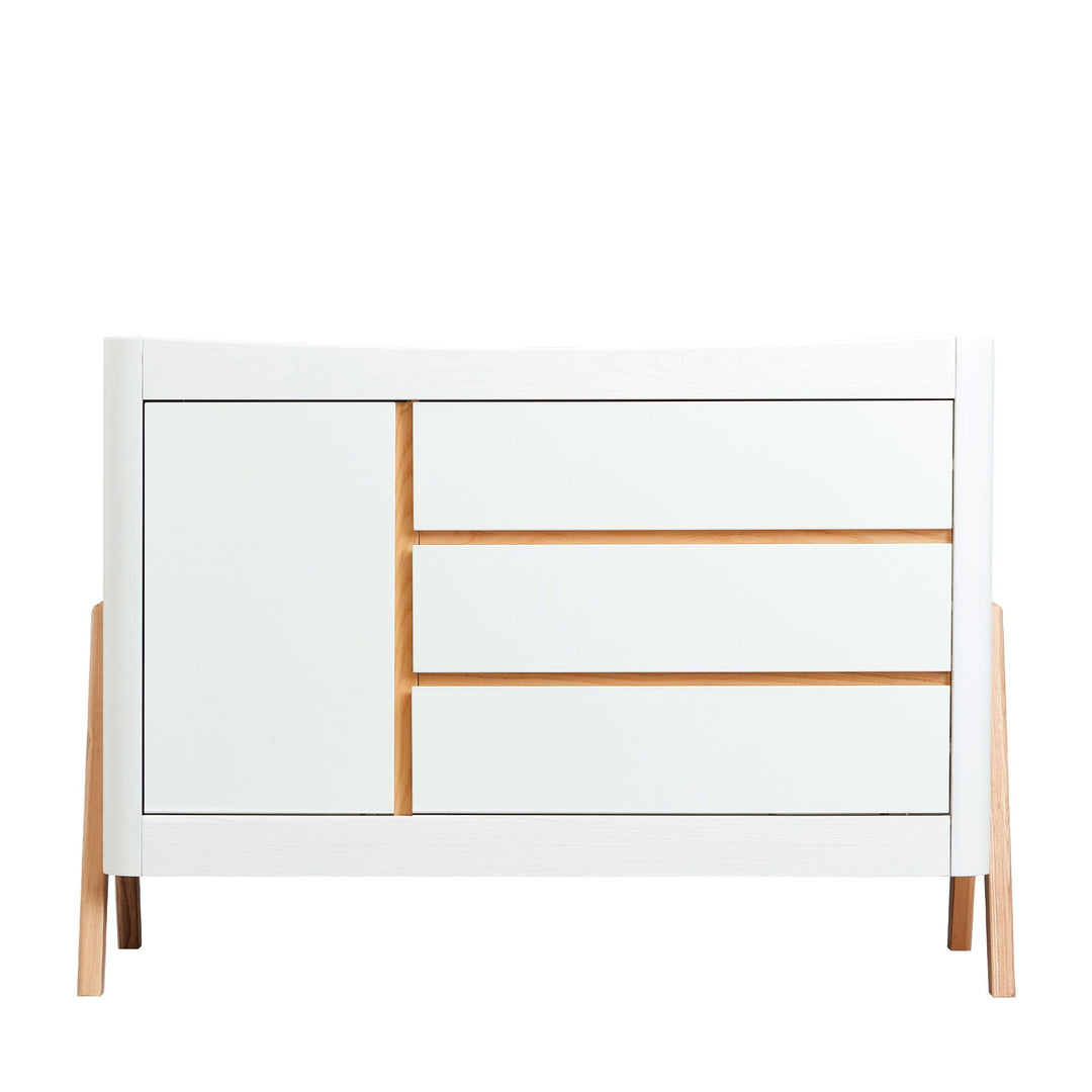 Gaia Baby Hera Dresser in Natural white and Oak. A Solid wood white dresser with three drawers and a side cabinet.